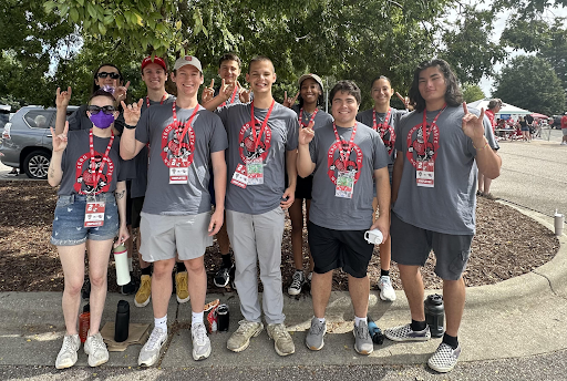 Picture of Franklins volunteering for Zero Waste Wolfpack at first home football game, 9/14/2024